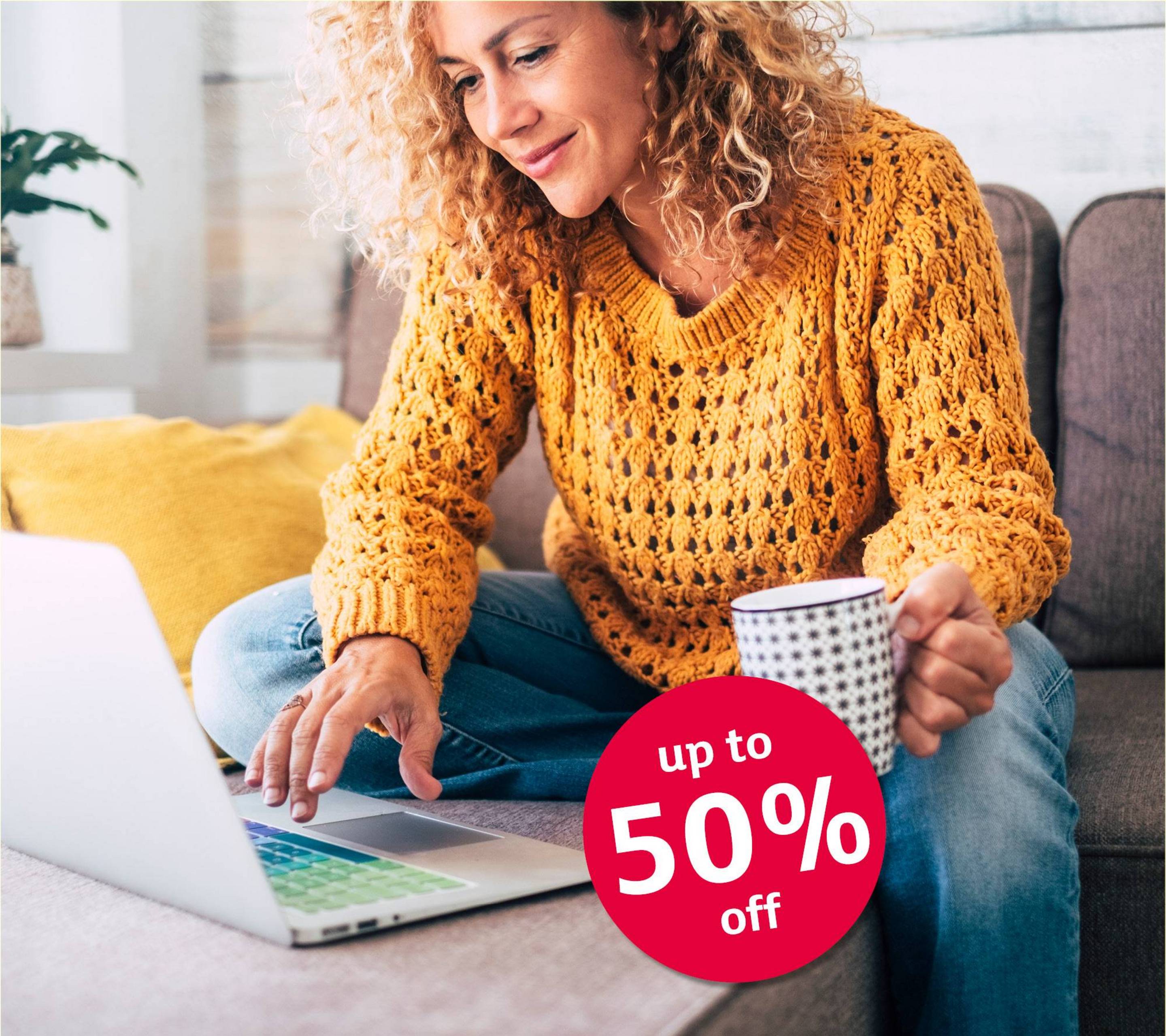 Woman is working on her laptop - 50% Sale bubble