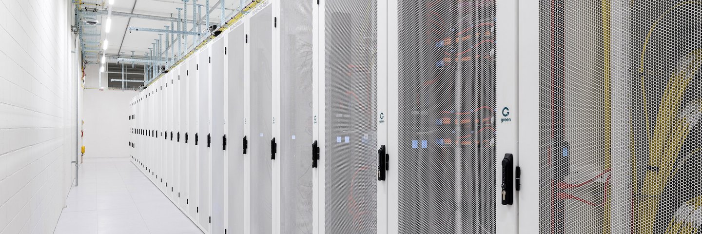 Green data center aisle with racks