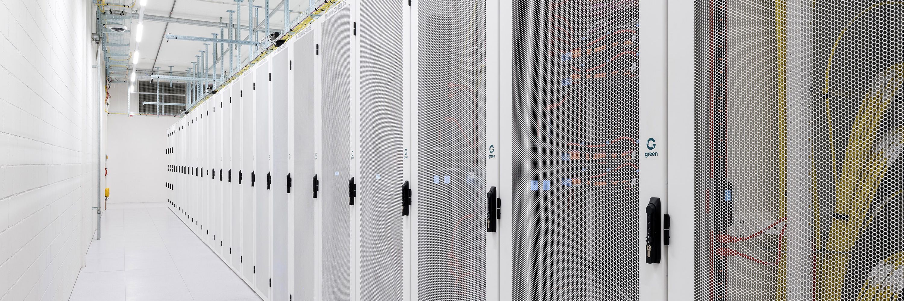 Green data center aisle with racks