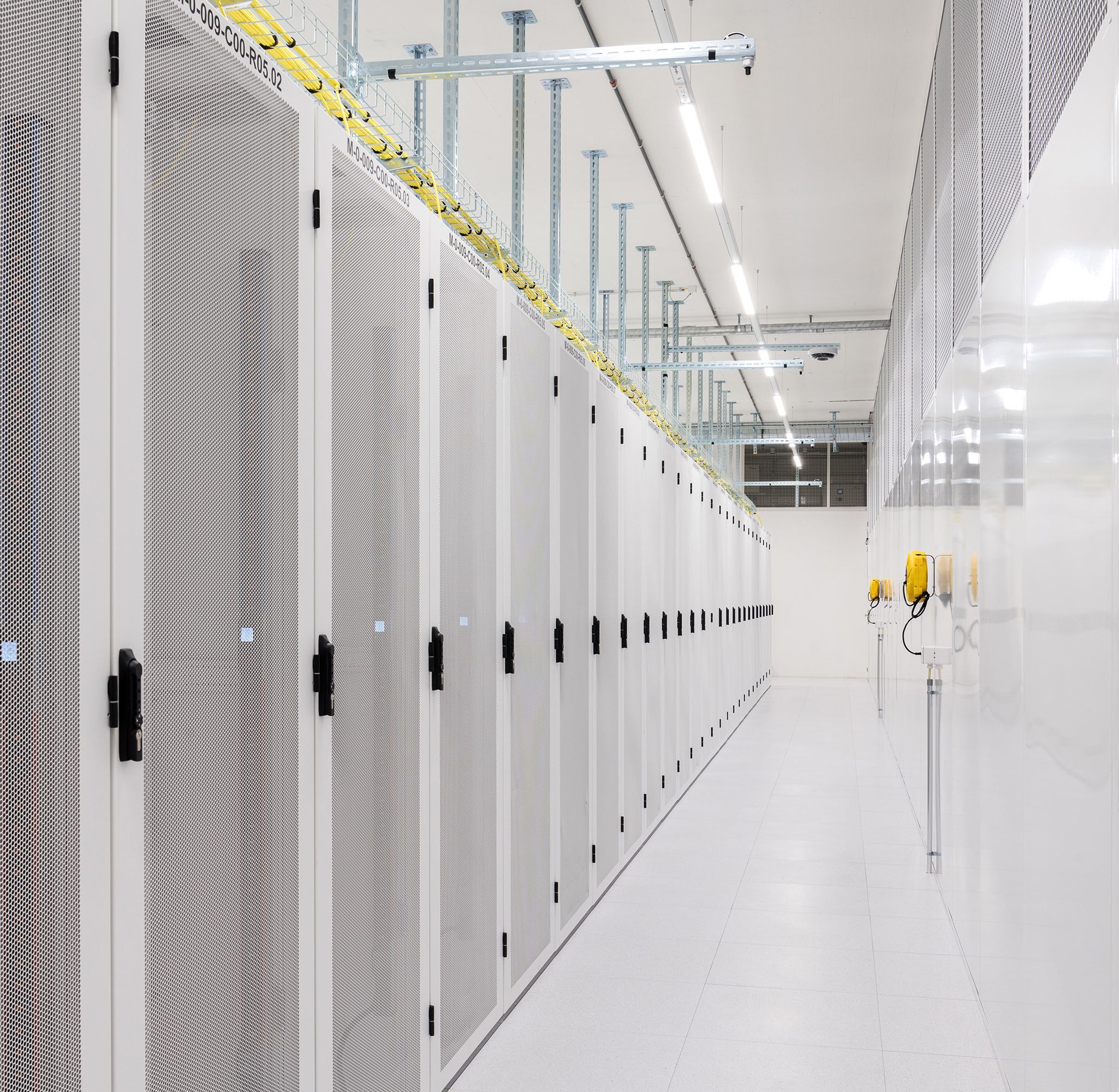 Green data center aisle with racks