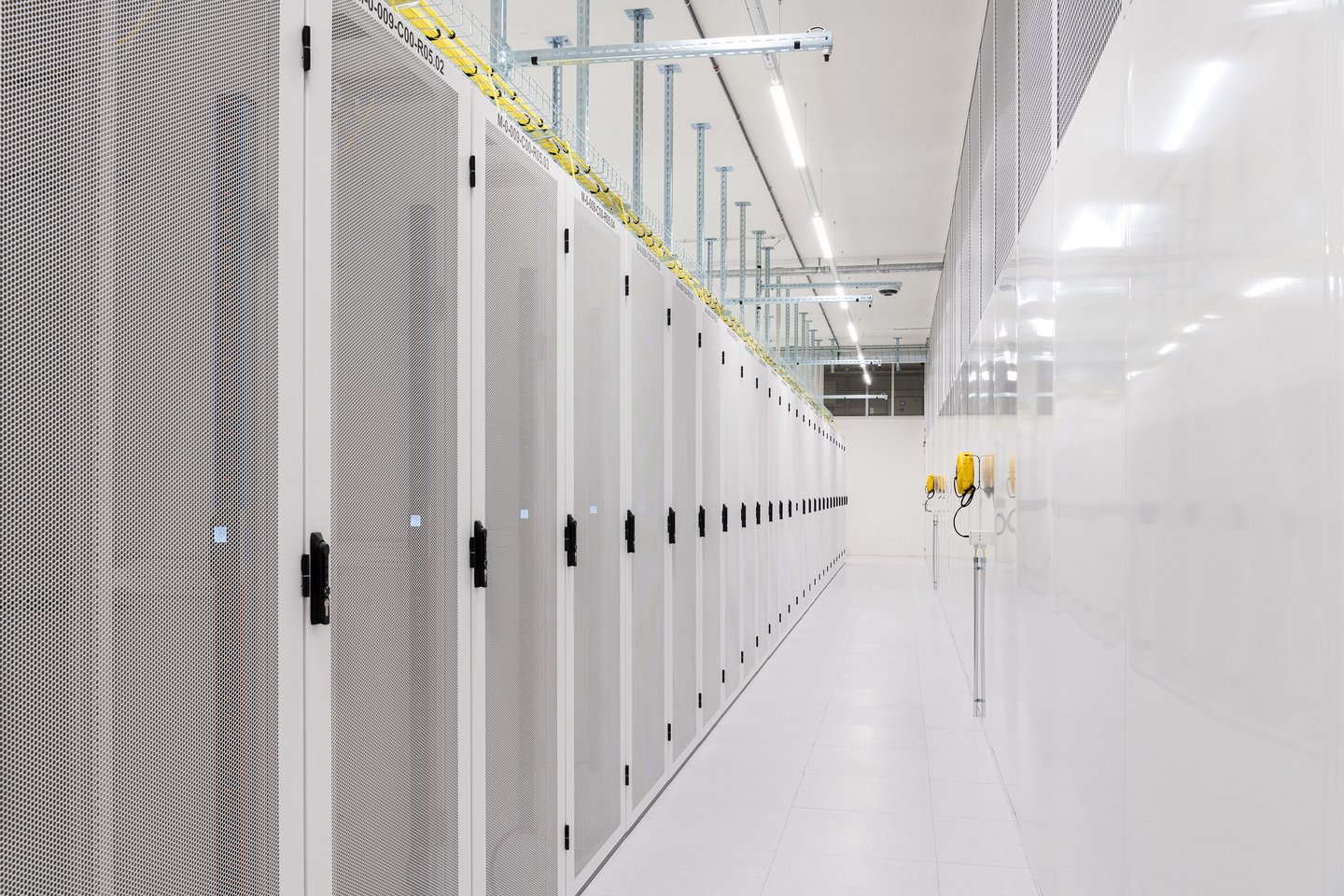 Green data center aisle with racks