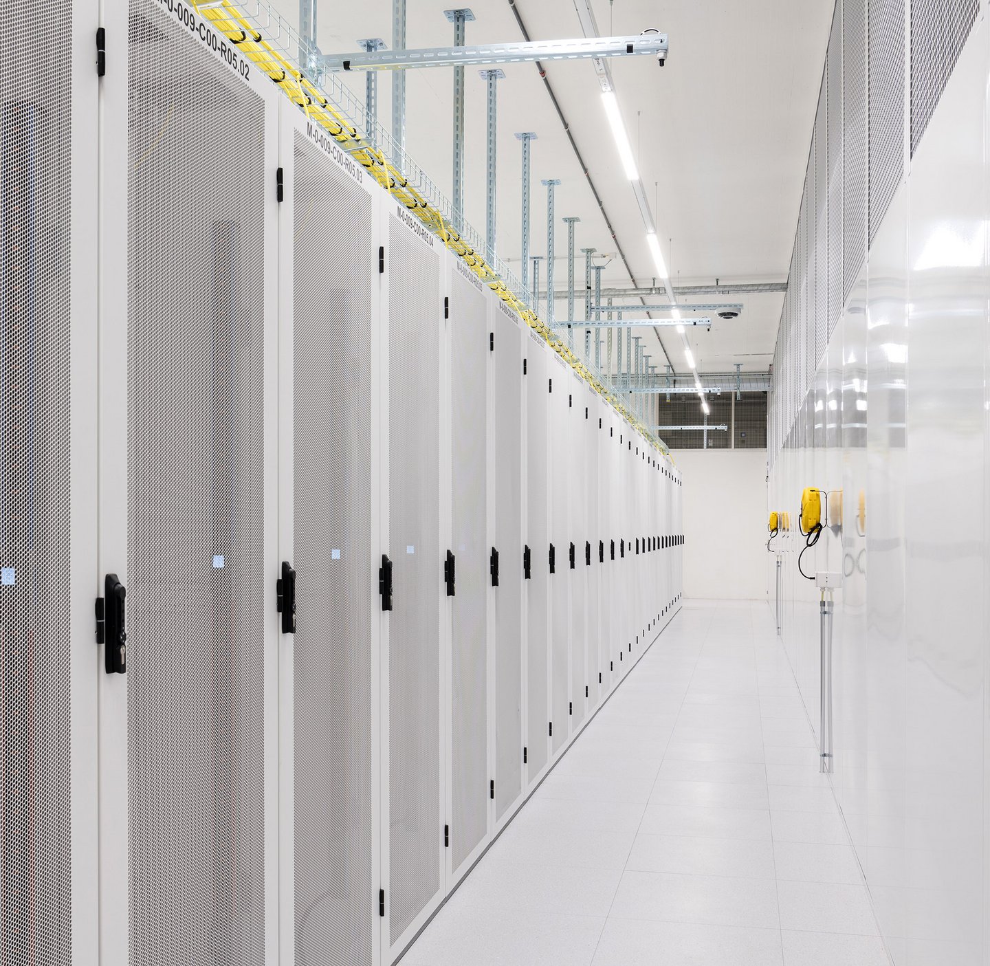 Green data center aisle with racks