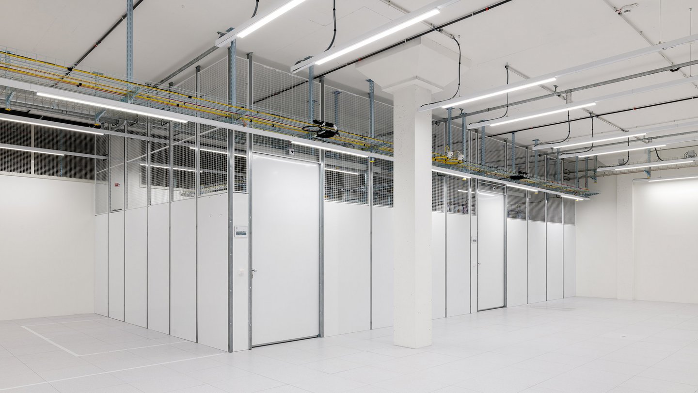 Green Datacenter empty room with cages