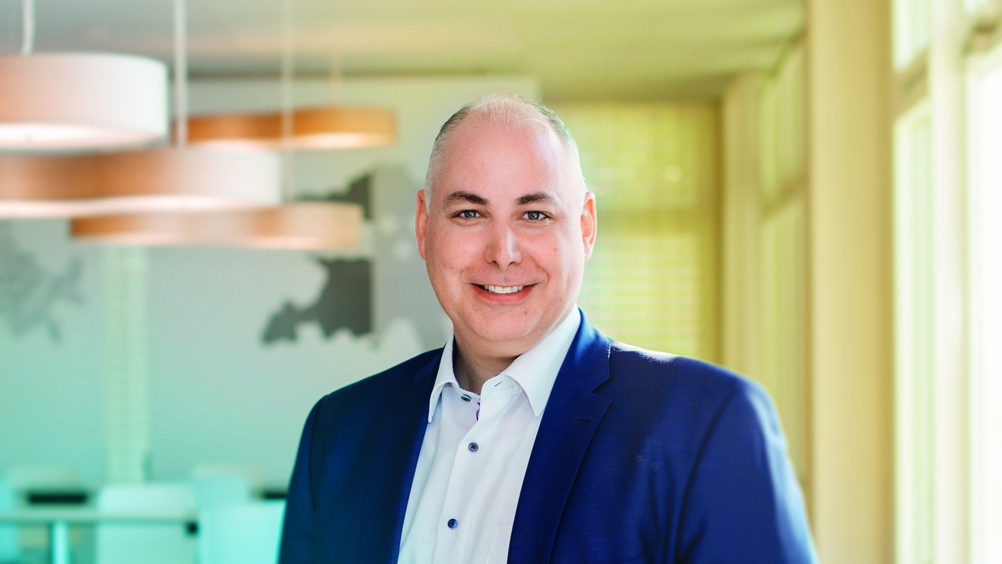 Roger Süess smiles